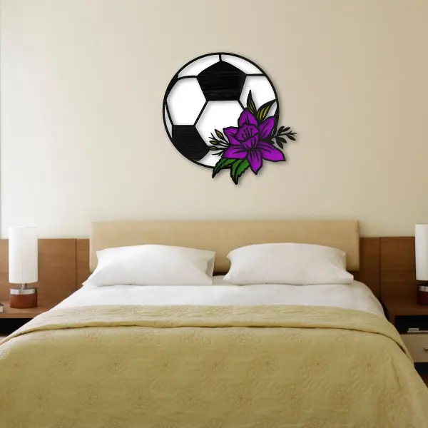 Balon de futbol y flor